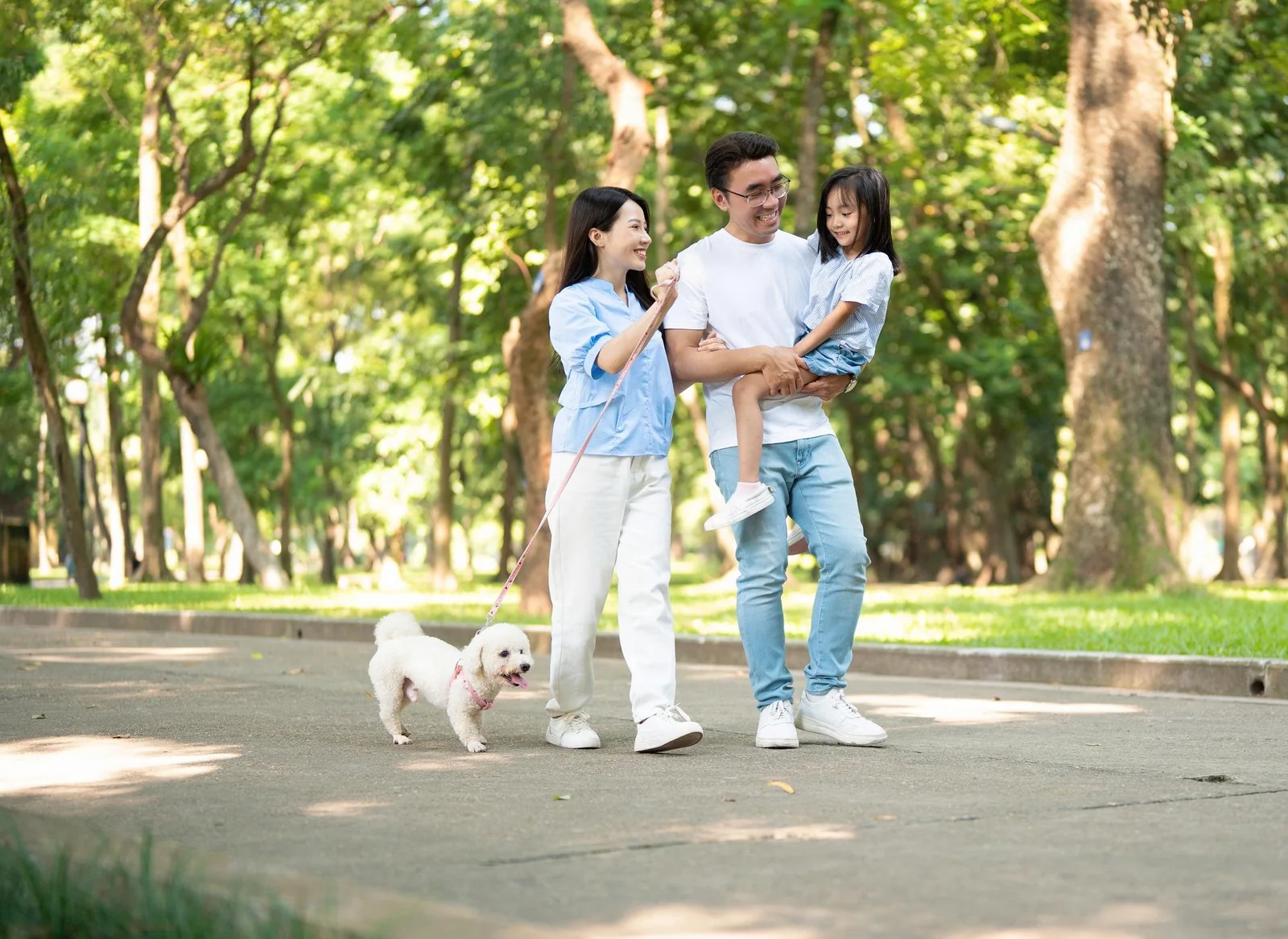 Family walking together through the gardens