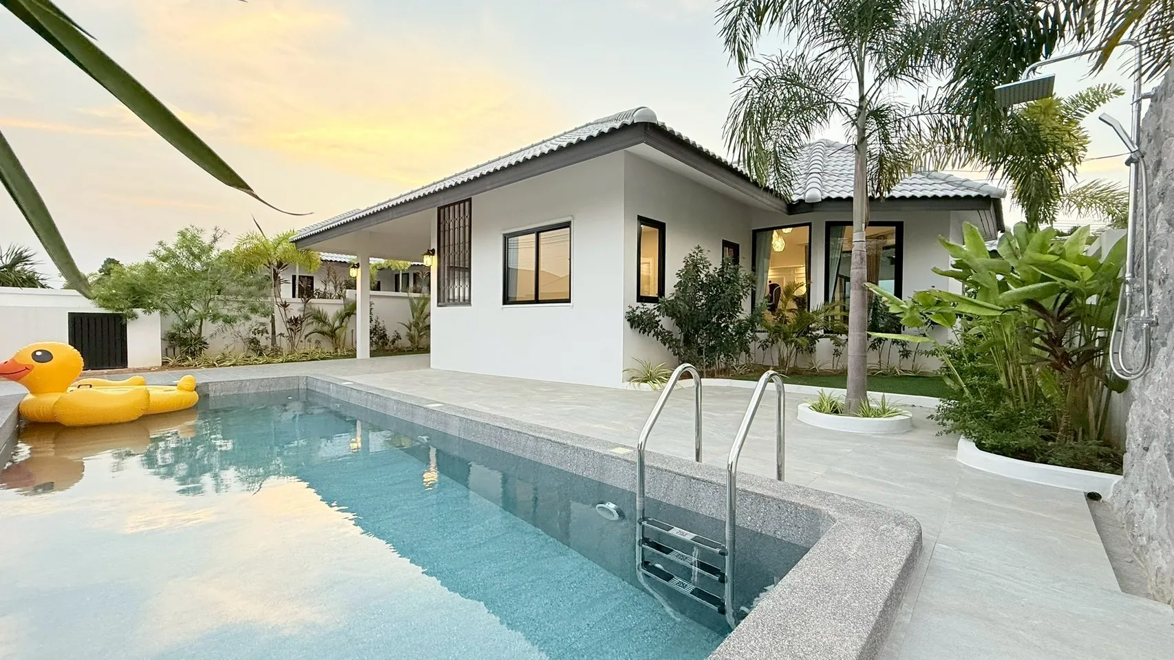 Pool and villa at golden hour