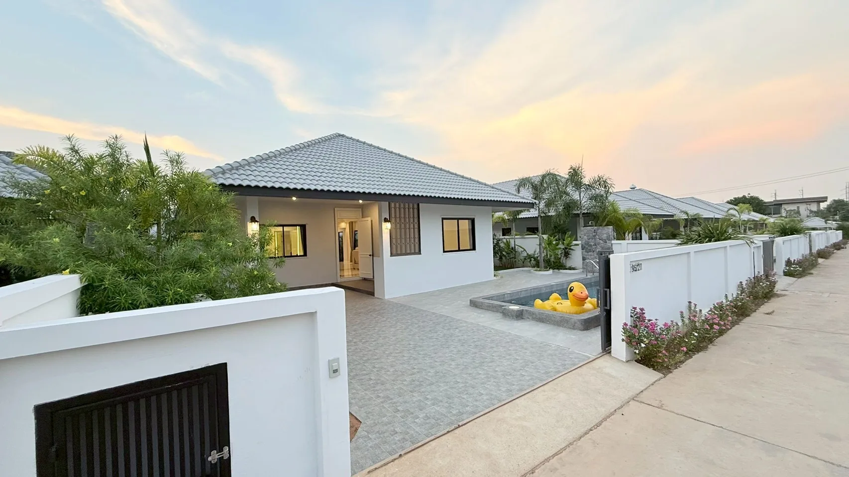 Private villa and pool from the street